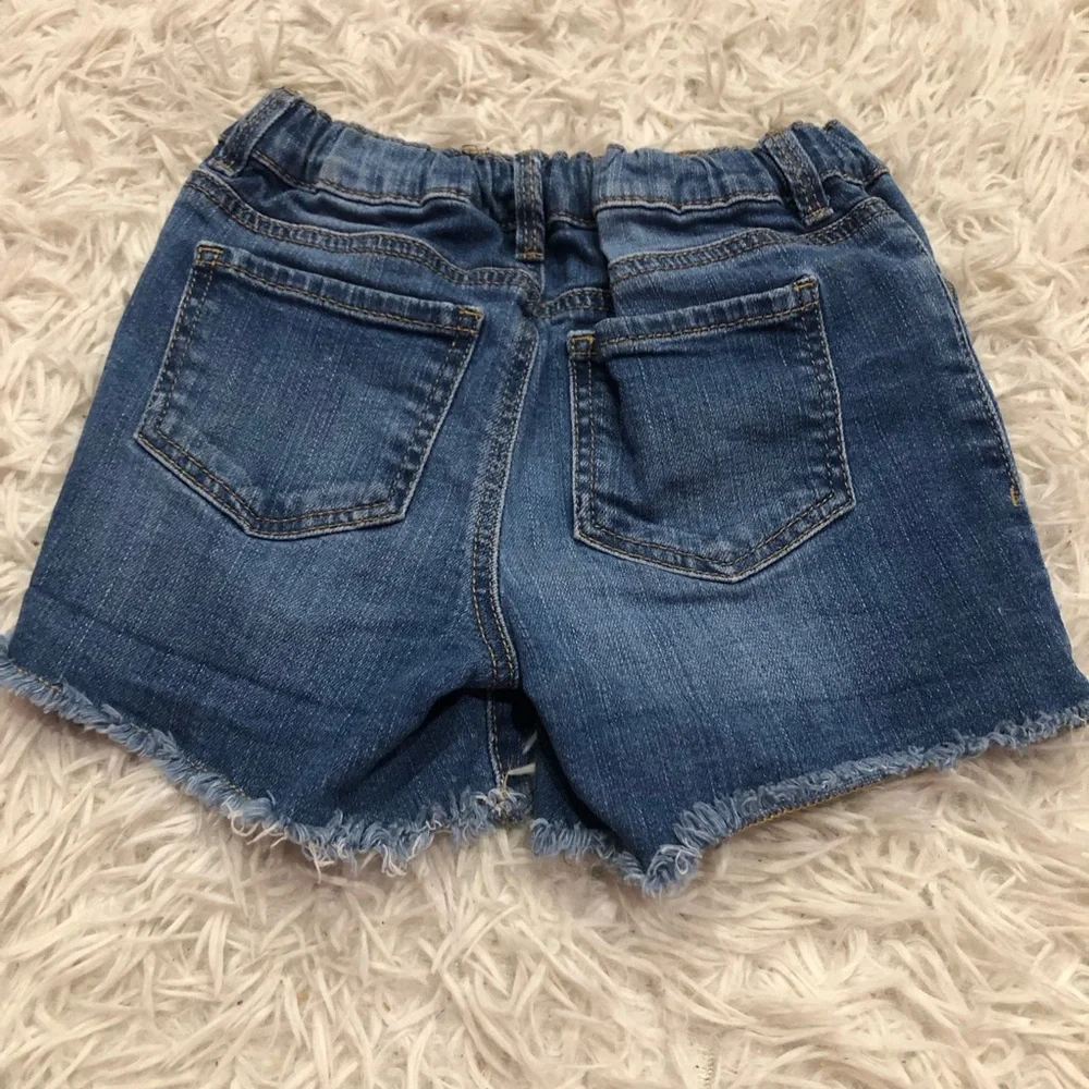 - OshKosh B'gosh Daisy Stretch Denim Shorts girls size 5T